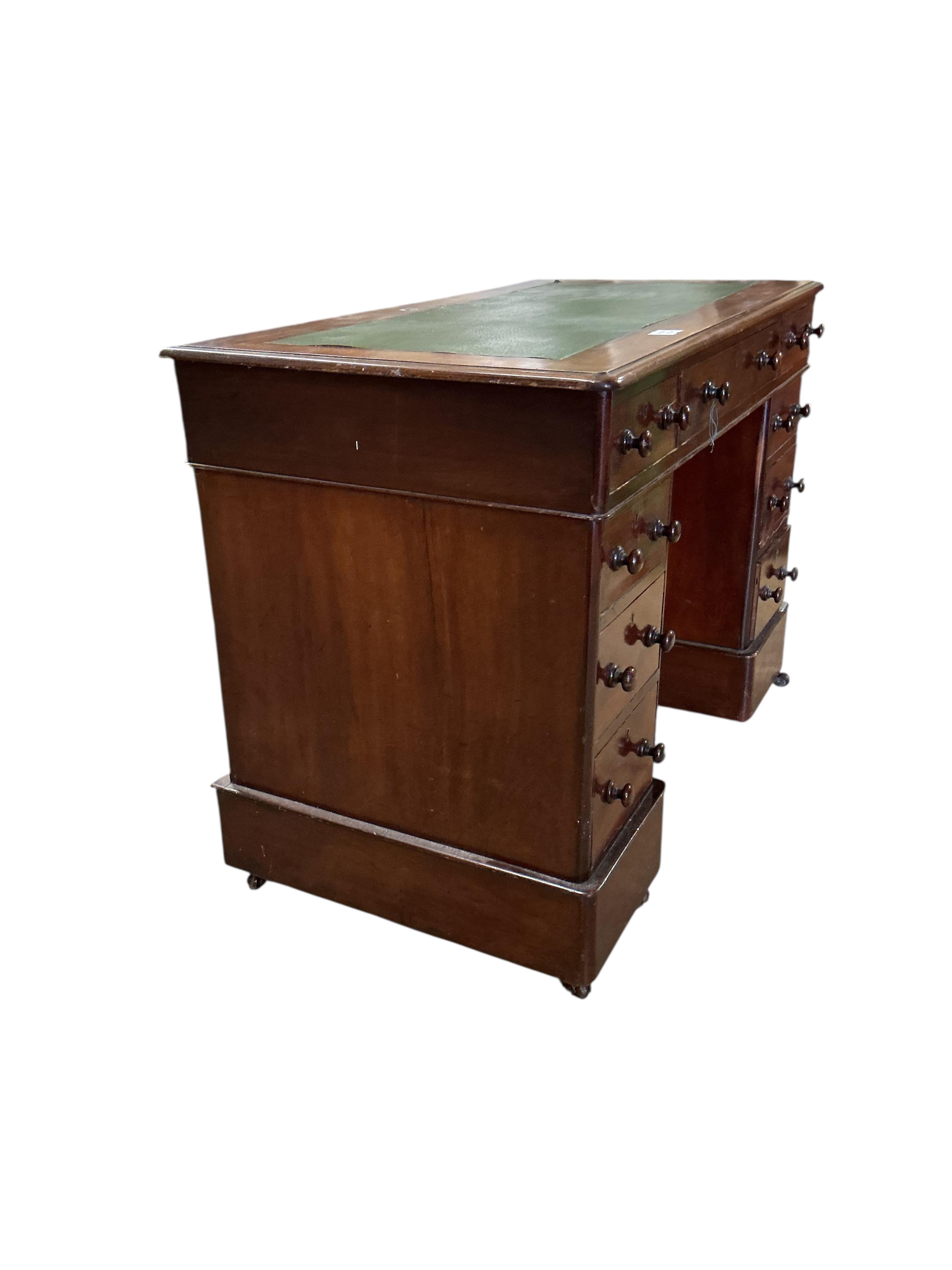 A Victorian mahogany pedestal desk, width 103cm, depth 56cm, height 76cm